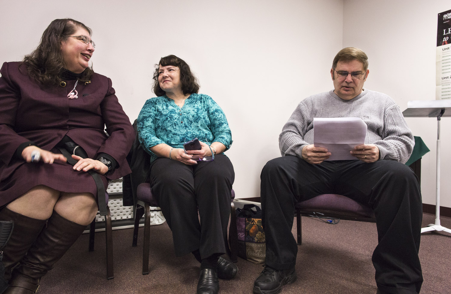   Christi sits with Wendy Goble, center, and Jim Goble at an adult Sunday School session before Easter Sunday Worship at Albany Baptist Church. 